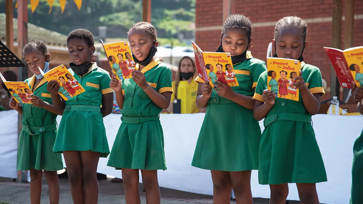 Children reading at Danganya Primary School